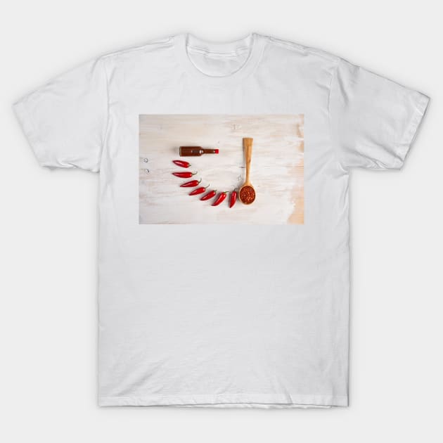 Chili peppers, flakes and hot sauce T-Shirt by naturalis